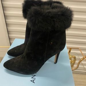 Black antonio melani fur ankle booties.